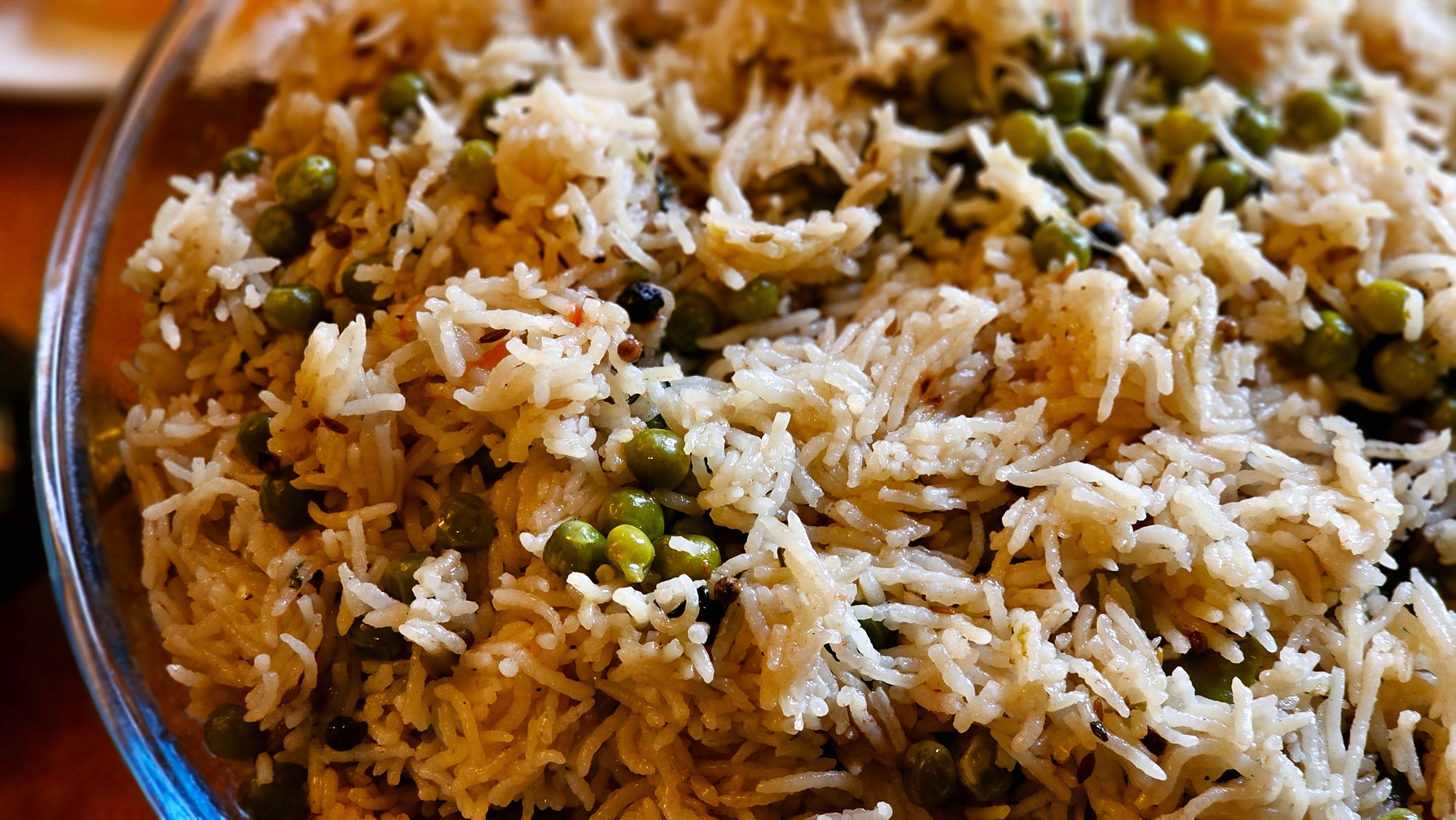 Double steam rice cooked perfectly fluffy separate grains